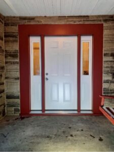 White front entry door with matching sidelights